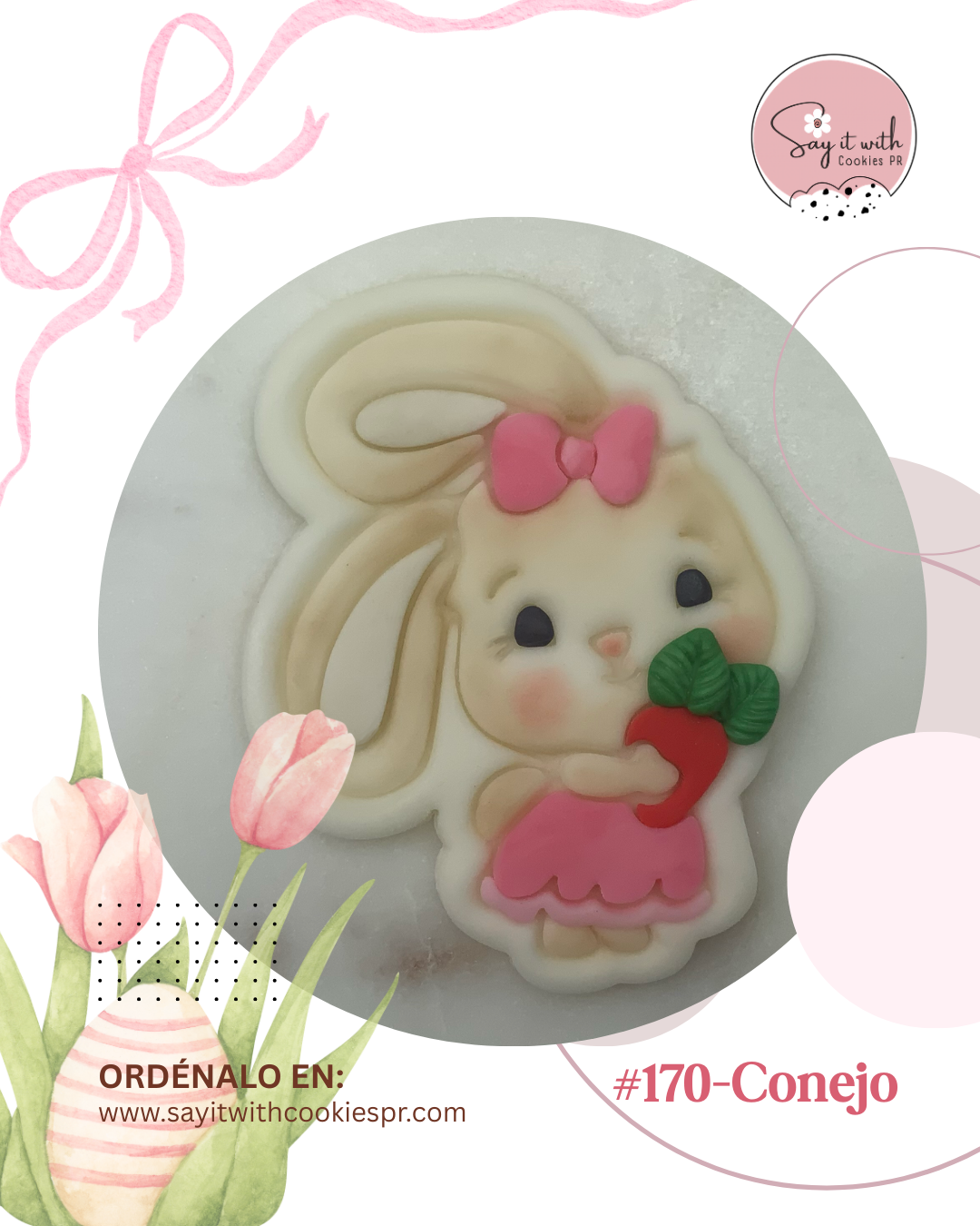 Cookie cutter and stamp with rabbit design with ribbon and carrot.
