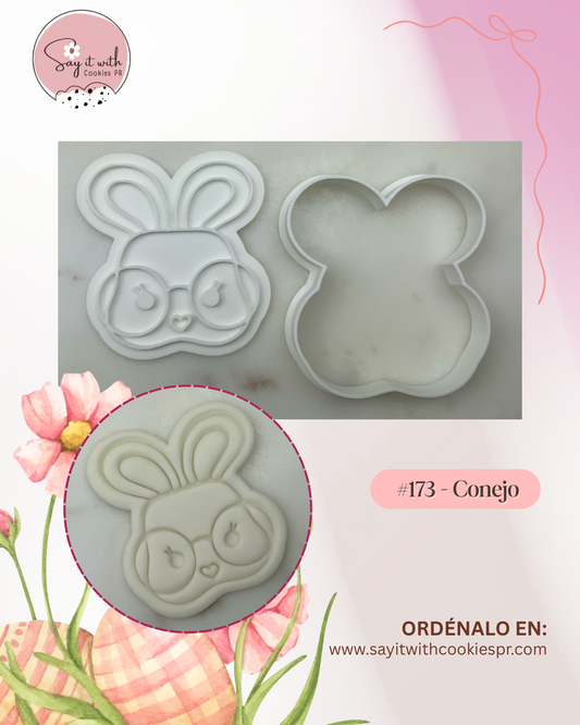 Cookie cutter with rabbit and eyeglass design.